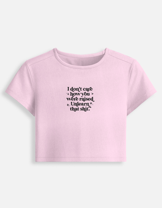 Front_1_c_45-6.jpg Unlearn that Shit - Baby Tee